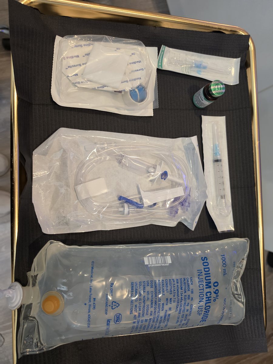 Sterile, single-use IV supplies prepared on a tray before a drip at Serene Med Spa